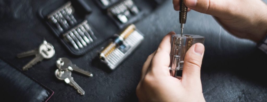 Locksmith working on a lock cylinder